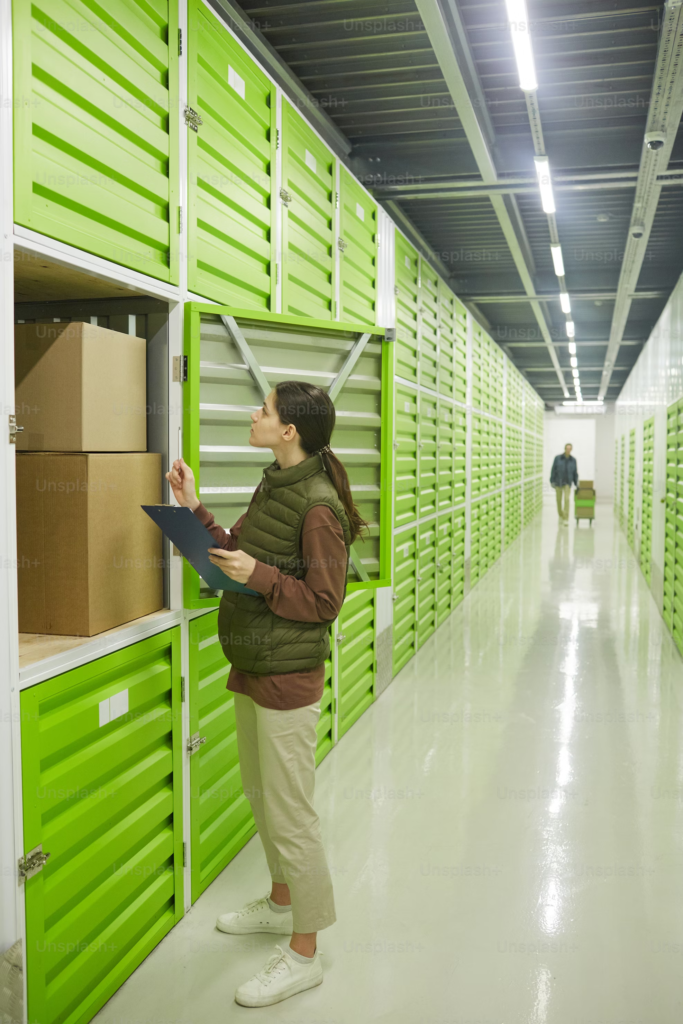 Woman checking storage units